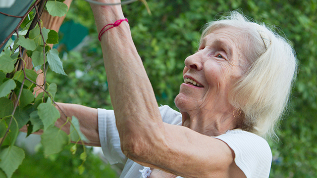 an elderly woman smiling